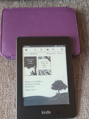 Amazon Kindle with Purple Cover